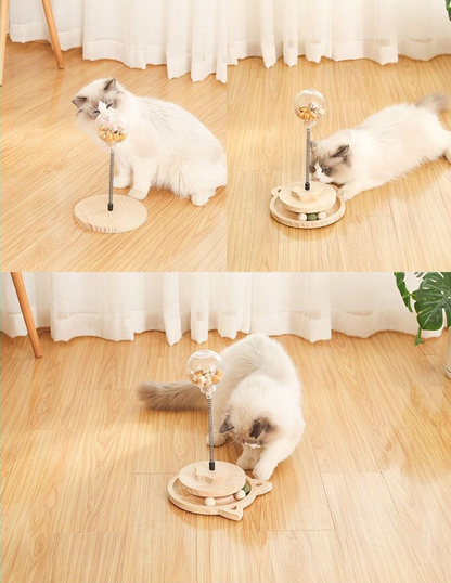 Treat dispensing spring-loaded cat toy